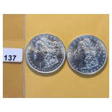 Two AU Morgan Silver Dollars