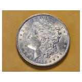 AU 1886 Morgan Silver Dollar