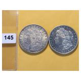 Two AU Morgan Silver Dollars