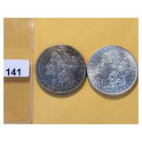Two AU Morgan Silver Dollars
