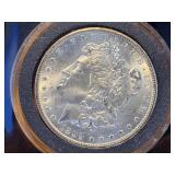 AU 1899-O Morgan Silver Dollar