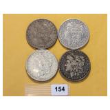 Four Circulated Morgan Silver Dollars