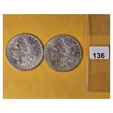 Two About Uncirculated Morgan Silver Dollars
