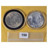 Two Brilliant AU Peace Silver Dollars