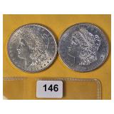 Two About Uncirculated Morgan Silver Dollars