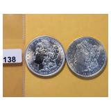 Two AU Morgan Silver Dollars