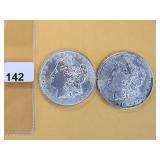 Two AU Morgan Silver Dollars