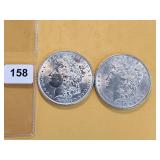 Two AU Morgan Silver Dollars