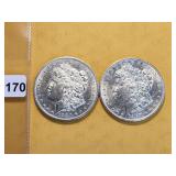 Two AU Morgan Silver Dollars