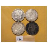 Four Circulated Morgan Silver Dollars