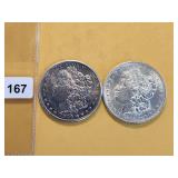 Two AU Morgan Silver Dollars