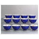 QING DYNASTY BLUE-GLAZED ENAMEL TWELVE FLOWER...