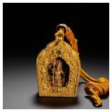 A GILT-BRONZE BOX OF THE EIGHT AUSPICIOUS...