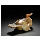 TANG DYNASTY HETIAN JADE RED-SOAKED MANDARIN...