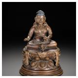 A BRONZE STATUE OF THE YELLOW GOD OF WEALTH...