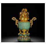 A QING DYNASTY GILDED COPPER INCENSE BURNER...