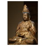 A GILDED BRONZE STATUE OF THE GREAT BODHISATTVA...