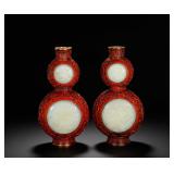 A PAIR OF RED AND WHITE JADE GOURD-SHAPED...