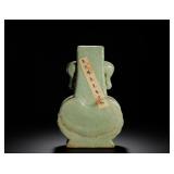 A CELADON ELEPHANT EAR VASE FROM THE LONGQUAN...
