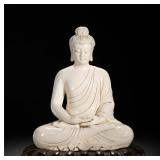 A SITTING BUDDHA OF SAKYAMUNI INSCRIBED BY HE...
