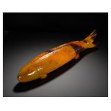 A REALISTIC LARGE CARP FIGURINE FROM HUANGQIN...