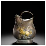 TANG DYNASTY SILVER-GILT LEATHER BAG