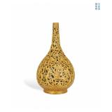 QING KANGXI YELLOW GLAZED HOLLOWED-OUT...