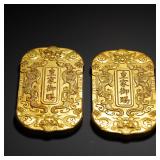 A PAIR OF GILDED BRONZE TOKENS BESTOWED BY...