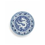 A LARGE PLATE OF BLUE AND WHITE PORCELAIN WITH...