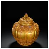 GILDED BRONZE JAR WITH INLAID SANSKRIT LOTUS...