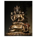 A GILDED BRONZE STATUE OF BODHISATTVA...