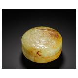 QING DYNASTY HETIAN HUANGQIN JADE ROUND DRAGON,...