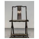 A STRAIGHT-BACKED CHAIR MADE OF SANDALWOOD WITH...