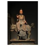 A PAINTED WOODCARVING OF THE MING DYNASTY...