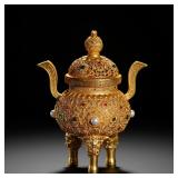 A GILDED BRONZE INCENSE BURNER WITH ENGRAVED...
