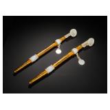 A PAIR OF GILDED FLOWER-ENCRUSTED HETIAN WHITE...