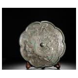 BRONZE MIRROR WITH A SINGLE DRAGON PLAYING WITH...