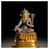 A GILT-BRONZE STATUE OF THE FREE AND EASY...