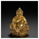 A GILDED BRONZE INCH-SIZED BUDDHA STATUE OF THE...