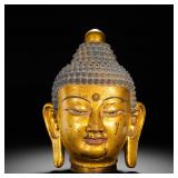 BRONZE GILDED BUDDHA HEAD OFFERINGS FROM THE...
