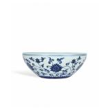 A LARGE BOWL OF BLUE AND WHITE PORCELAIN WITH...