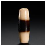 A SINGLE AGATE BEAD FROM THE MING DYNASTY