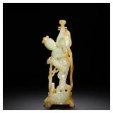 A NATURAL YELLOW INLAID THREE-DIMENSIONAL...