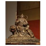 A GILDED BRONZE STATUE OF ZHAO GONGMING FROM...