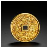 THE HAN DYNASTY GILDED COPPER COIN WITH FOUR...