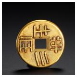 THREE ZHU AND A HALF LIANG OF GILDED COPPER...