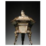 BRONZE HIGH-RELIEF ENGRAVED SILVER THREE-LEGGED...