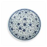A LARGE PLATE OF BLUE AND WHITE PORCELAIN WITH...