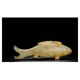 TANG DYNASTY HETIAN JADE FISH-SHAPED LID BOX