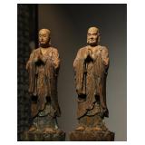 A PAIR OF STANDING STATUES OF VENERABLE ANANDA...